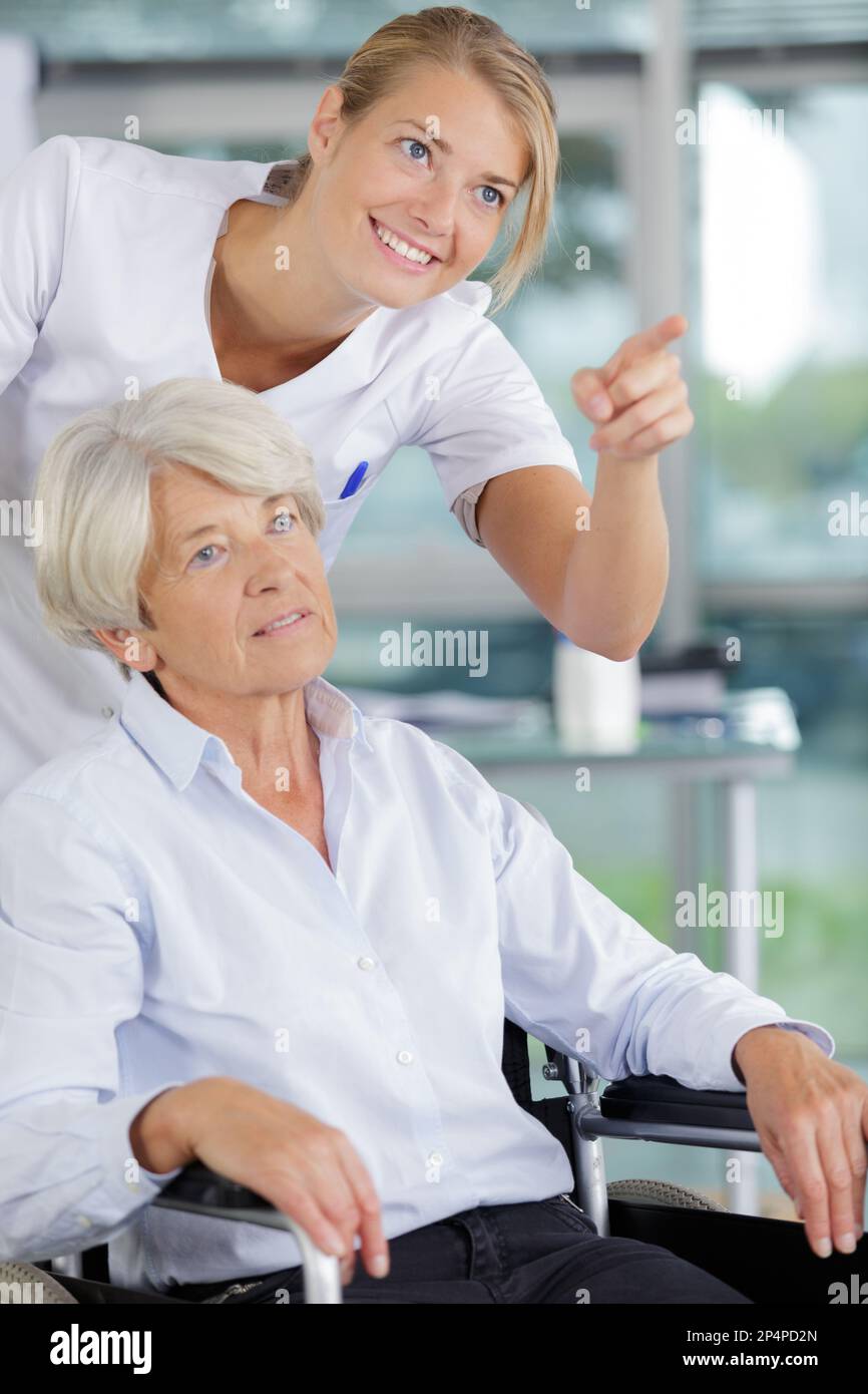 health visitor and a senior woman during home visit Stock Photo Alamy