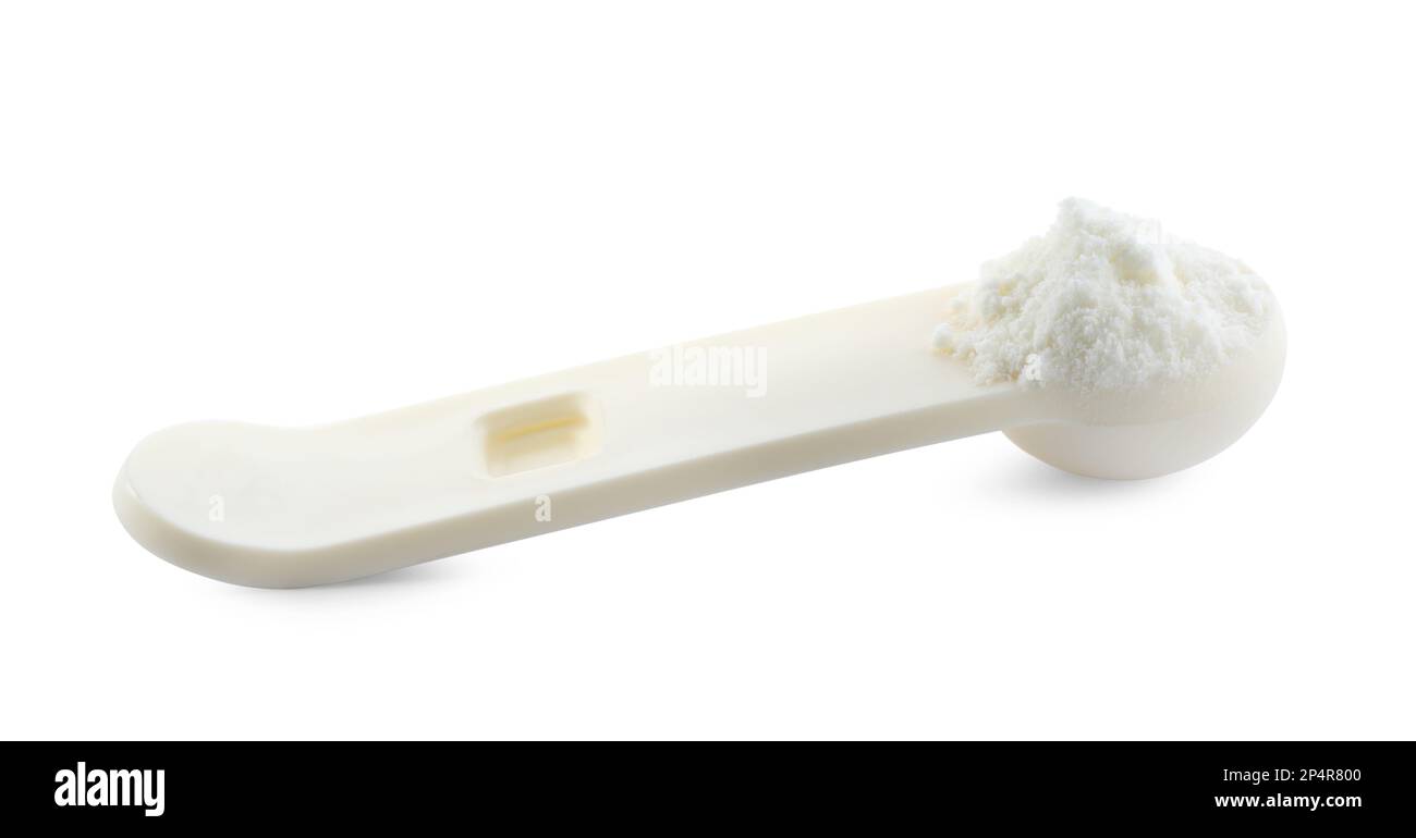 Measuring scoop of powdered infant formula isolated on white. Baby milk