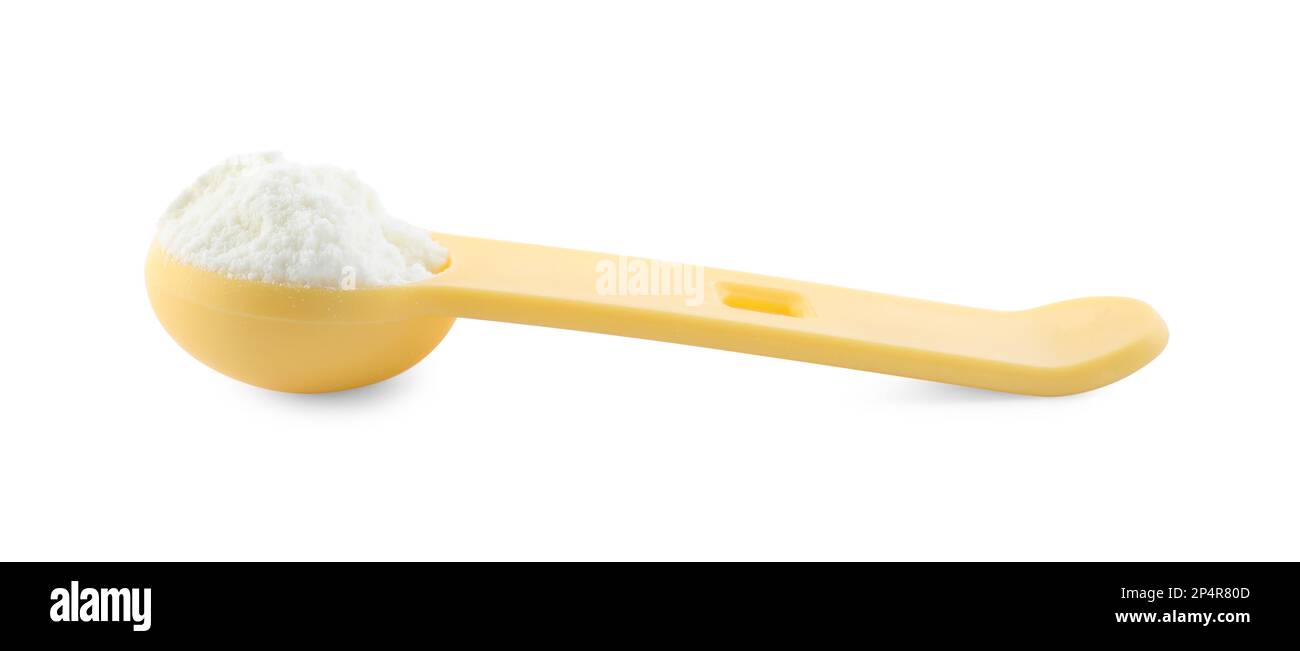 Measuring scoop of powdered infant formula isolated on white. Baby milk