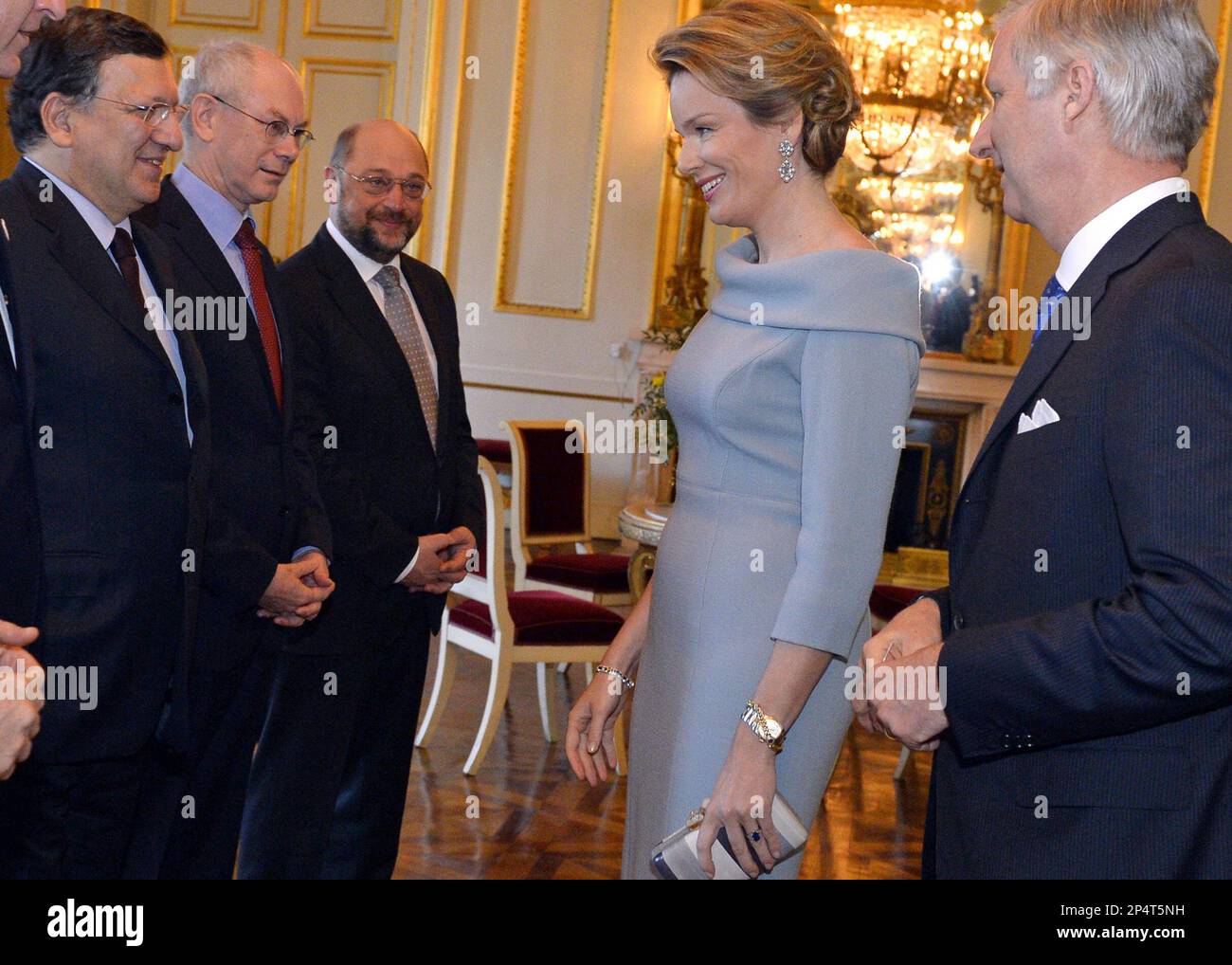 Belgium's King Philippe, right, and Queen Mathilde, second right, talk with with European Commission President Jose Manuel Barroso, left, European Parliament President Martin Schulz, center, and European Council President Herman Van Rompuy, second left, during a New Year's reception at the Royal Palace in Brussels, Friday, Jan. 10, 2014. Belgium's King Philippe invited EU officials from all the EU institutions in Brussels for the annual New Year's reception. (AP Photo/Eric Lalmand, pool) Stock Photo