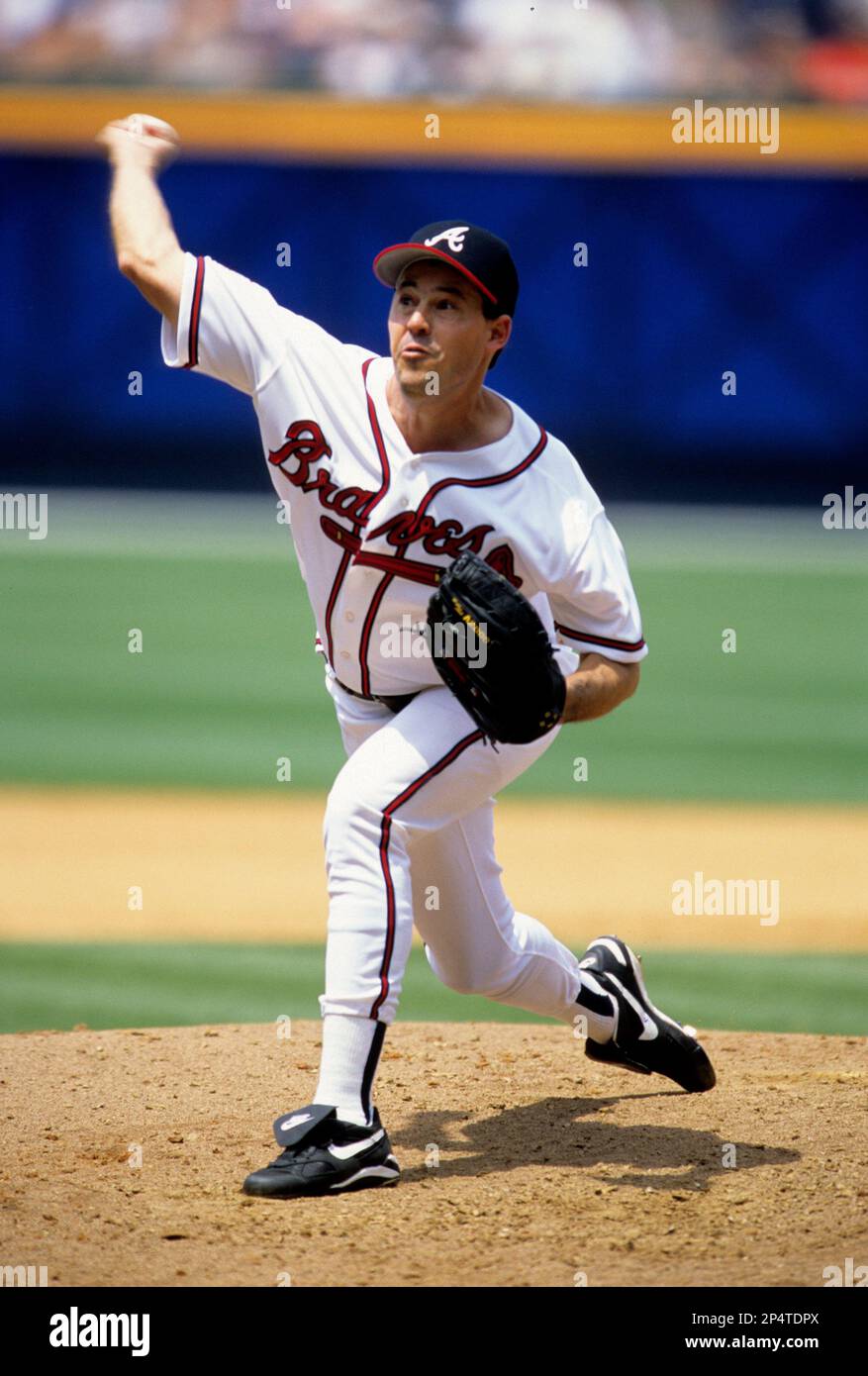 Atlanta Braves pitcher Greg Maddux pitches during a game. Circa Braves  (93-03) (AP Photo/Tom DiPace Stock Photo - Alamy