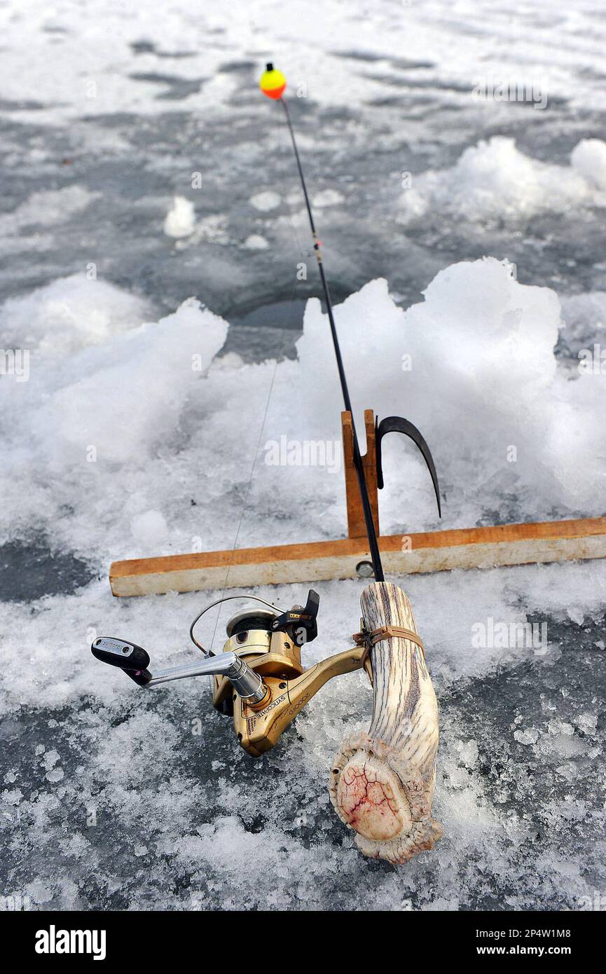 In this Dec. 26, 2013 photo, a handmade ice fishing rod, made by