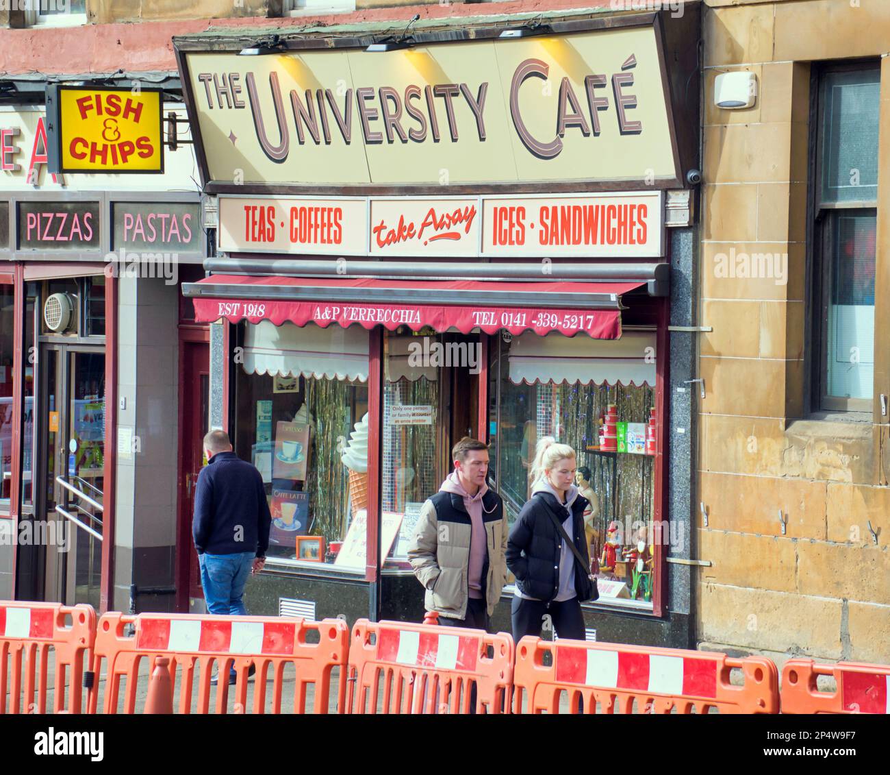 Glasgow, Scotland, UK 6th March, 2023. UK Weather:  Sunny start saw happier locals as the streets filled in the spring weather before the forecast return of winter. The famous university cafe on byres road a popular destination for ice cream lovers suffers from the roadworks blighting the city  in the sun. Credit Gerard Ferry/Alamy Live News Stock Photo