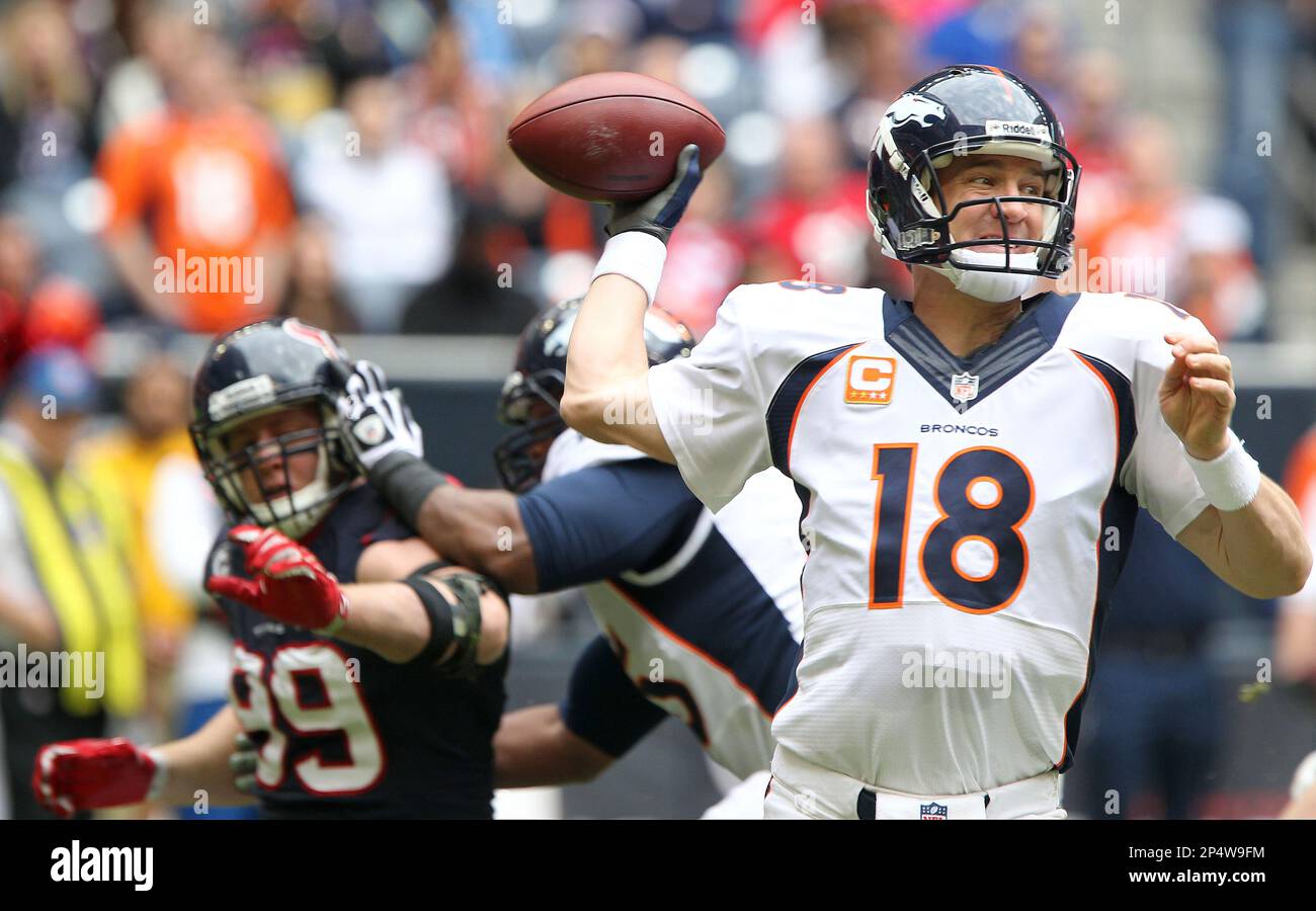 Denver Broncos quarterback Peyton Manning (18) drops back to pass ...