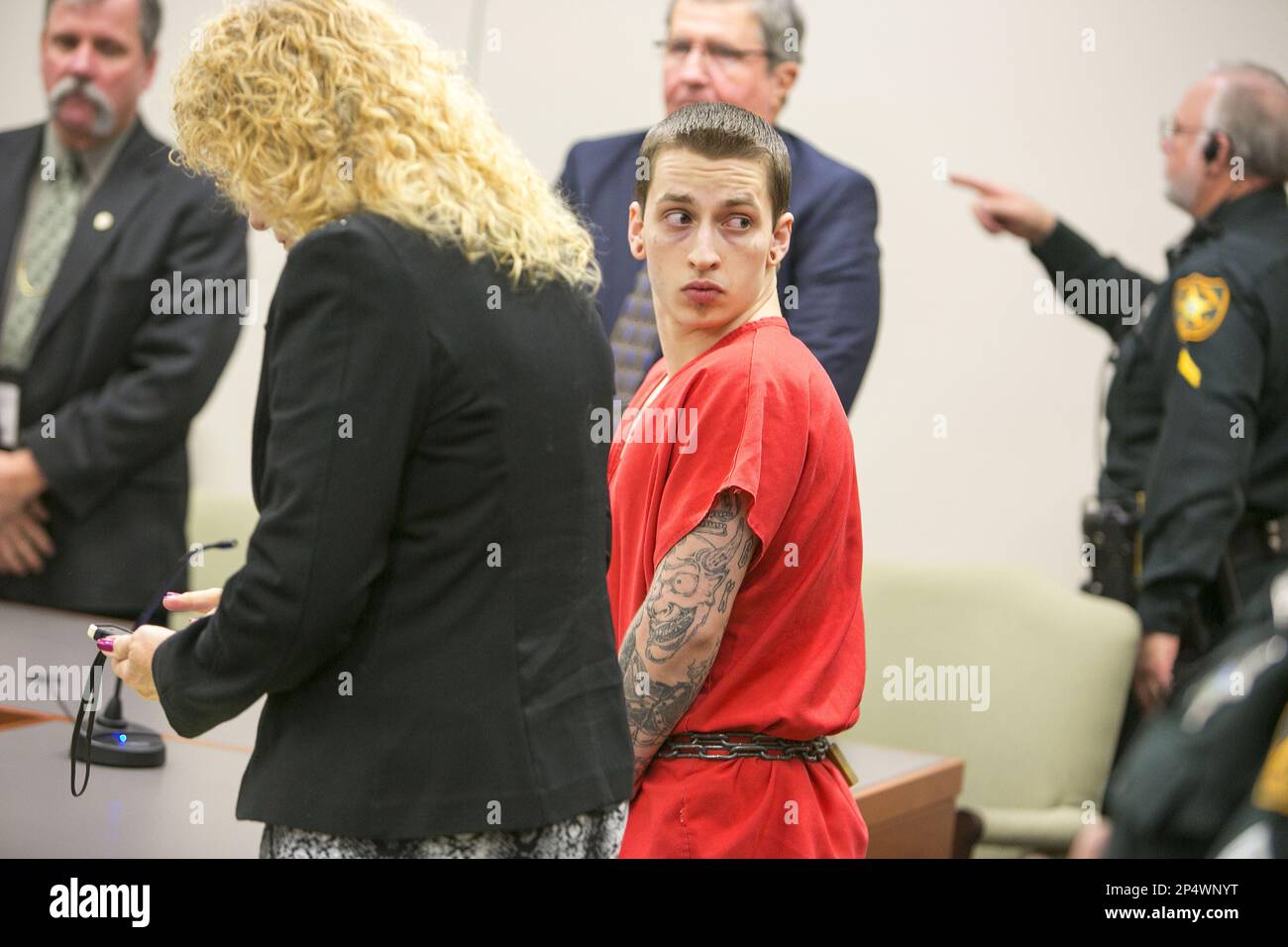 Michael Bargo looks back to his family upon arriving in the courtroom
