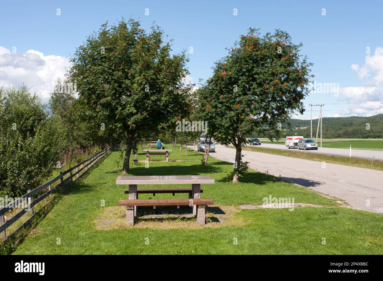 GLOMMA, NORWAY ON JULY 27, 2011. Rest area next to a highway. Unidentified people in the service area. Editorial use. Stock Photo