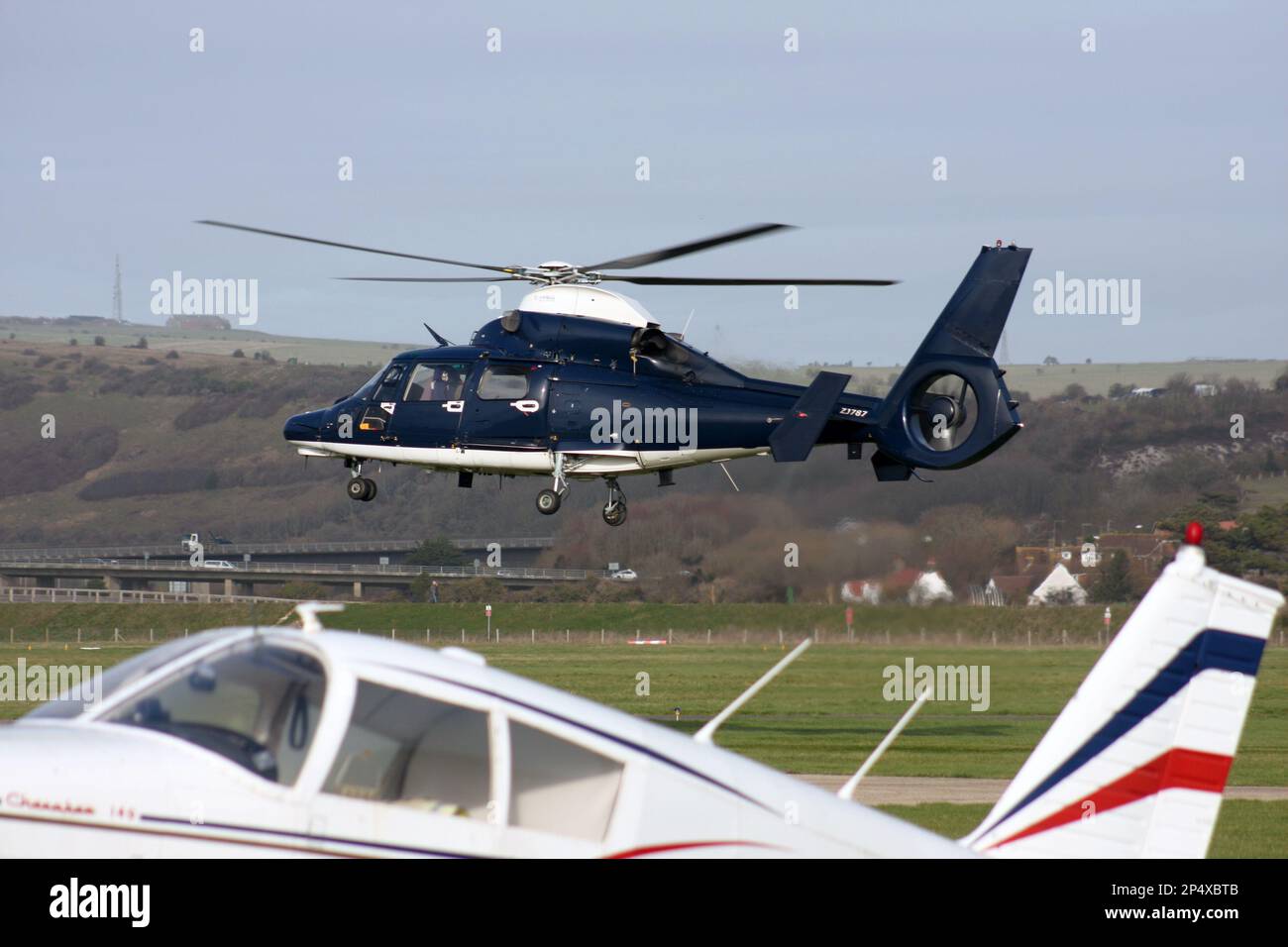 UK Army Air Corps Eurocopter AS 365N3 Dauphin departs Brighton City Airport Stock Photo