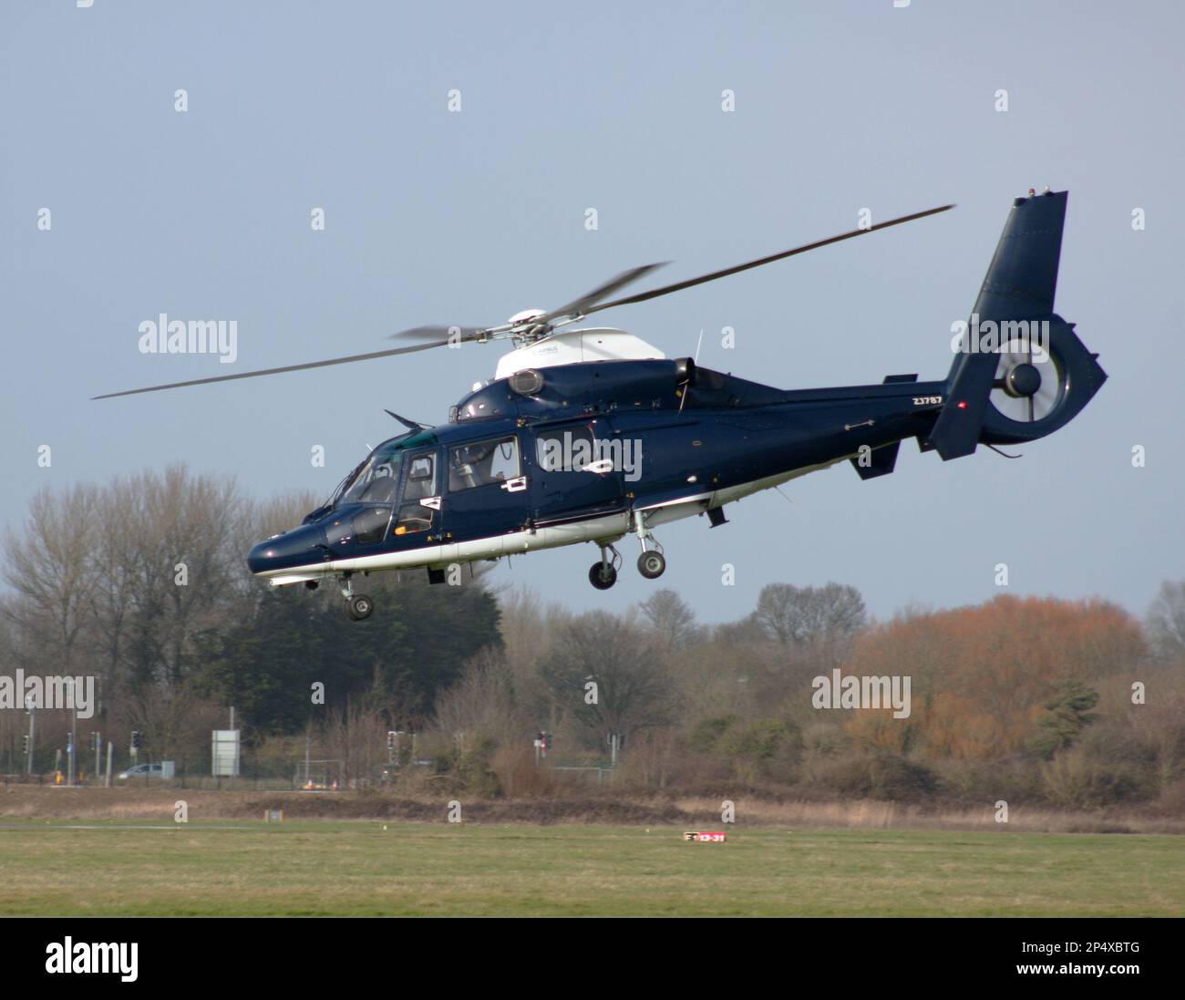 UK Army Air Corps Eurocopter AS 365N3 Dauphin departs Brighton City Airport Stock Photo