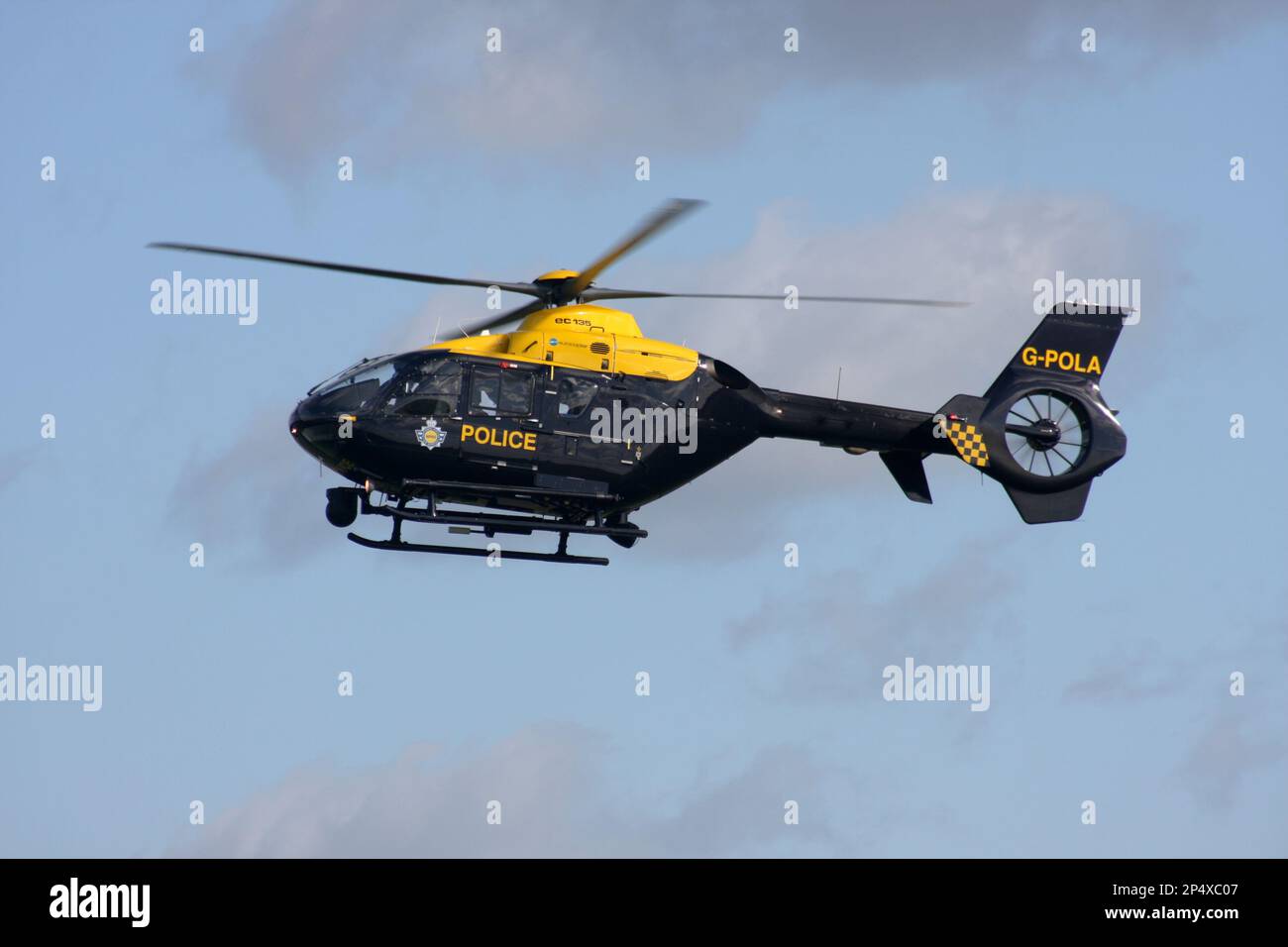 A Eurocopter EC 135P2+ of the UK Police Force arrives at Redhill Aerodrome Surrey England Stock Photo