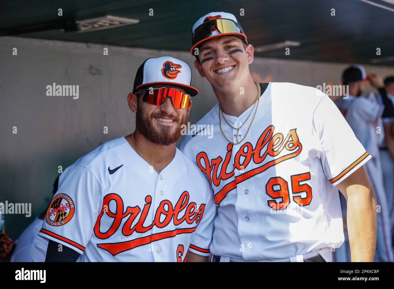 Sarasota FL USA; Baltimore Orioles shortstop Joey Ortiz (65) and infielder Coby Mayo (95) pose for a photo during an MLB spring training game against Stock Photo