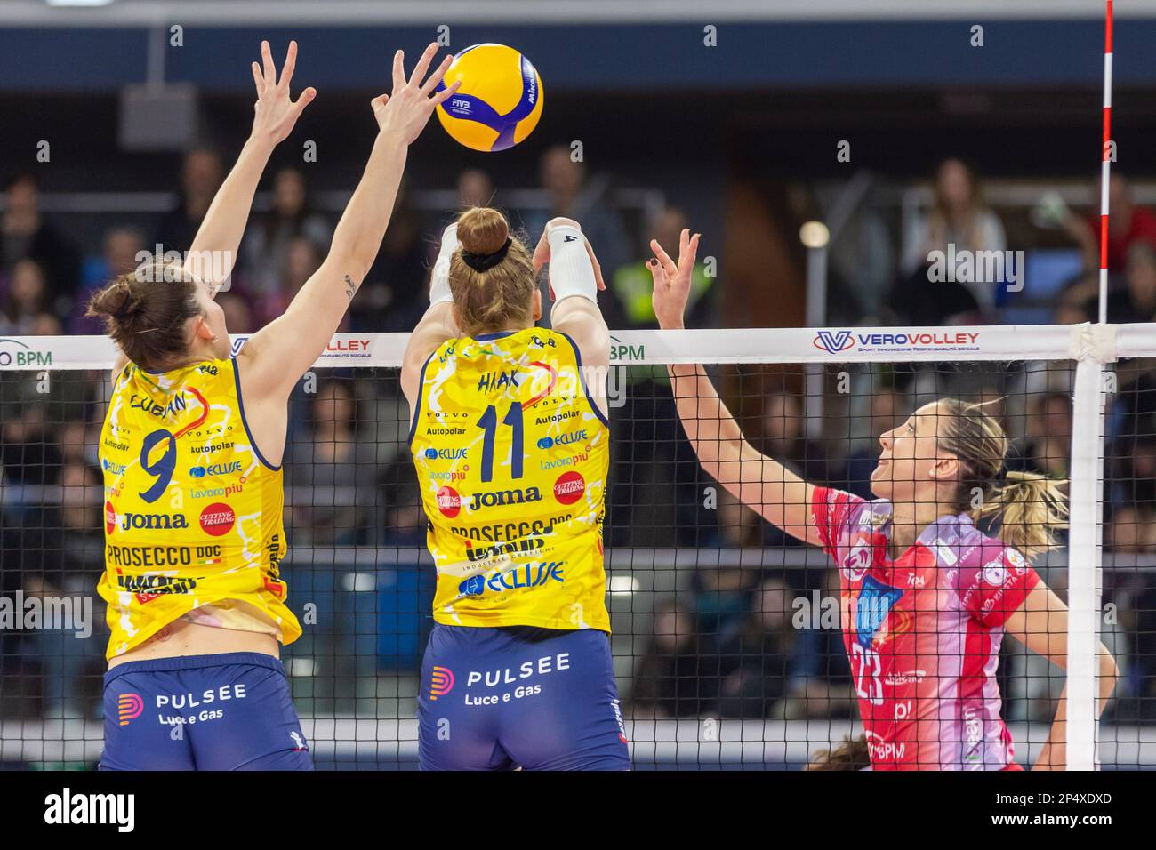 Attack of Jordan Larson (Vero Volley Milano) over the block of Stock ...