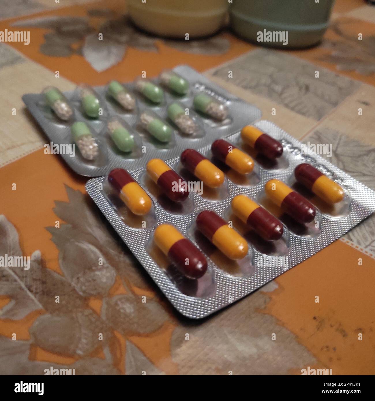 Homeopathic medicine consisting of the pills and a bottle containing a