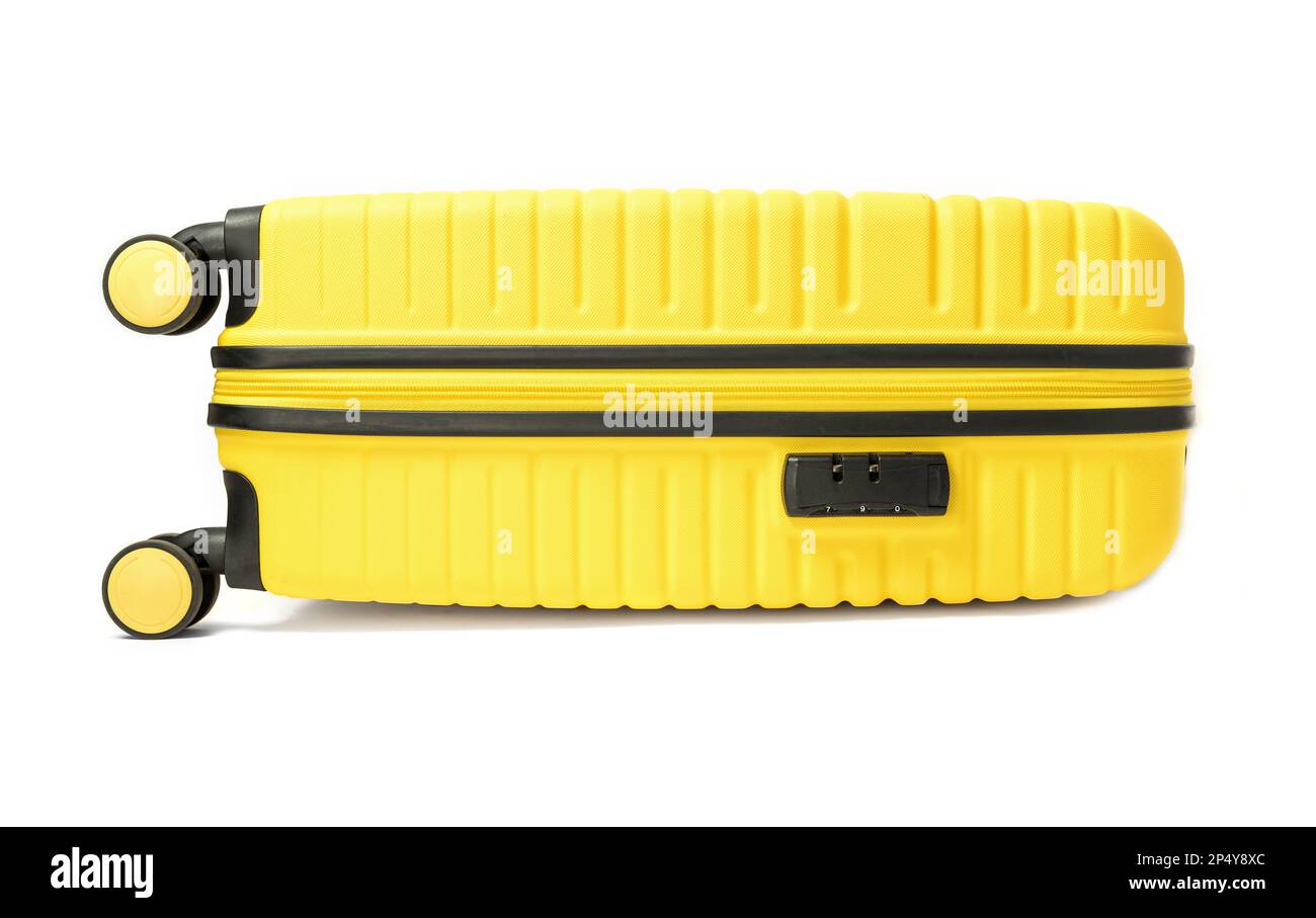 Yellow plastic suitcase isolated on white background. Stock Photo