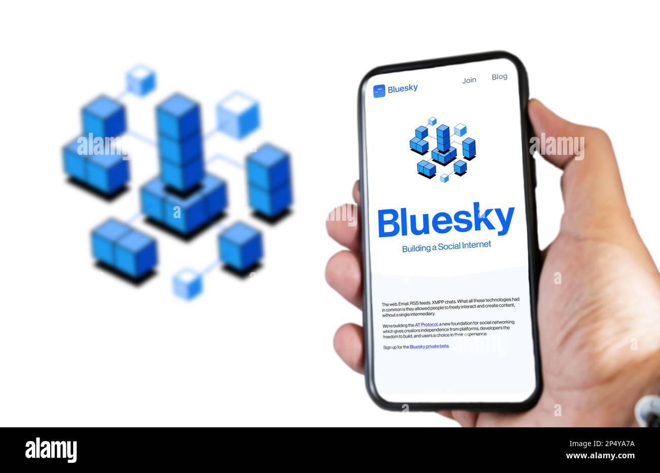 San Francisco, US, Feb 2023: hand holding a phone with Bluesky mobile app on screen. Bluesky is an initiative to develop a decentralized social networ Stock Photo