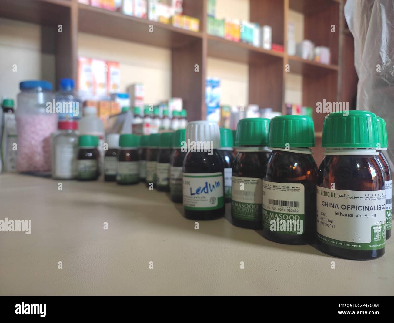 Homeopathic medicine consisting of the pills and a bottle containing a