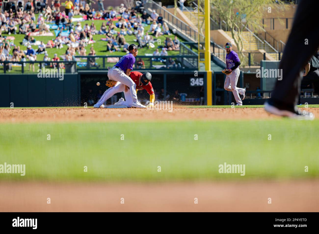 Deyvison De Los Santos (3B/1B) collides with Alan Trejo (INF) at second base during a MLB spring training Baseball game at Salt River Fields at Talking Stick, Saturday, Feb. 25, 2023, in Scottsdale, Ariz. (Annalee Ramirez/Image of Sport) Stock Photo