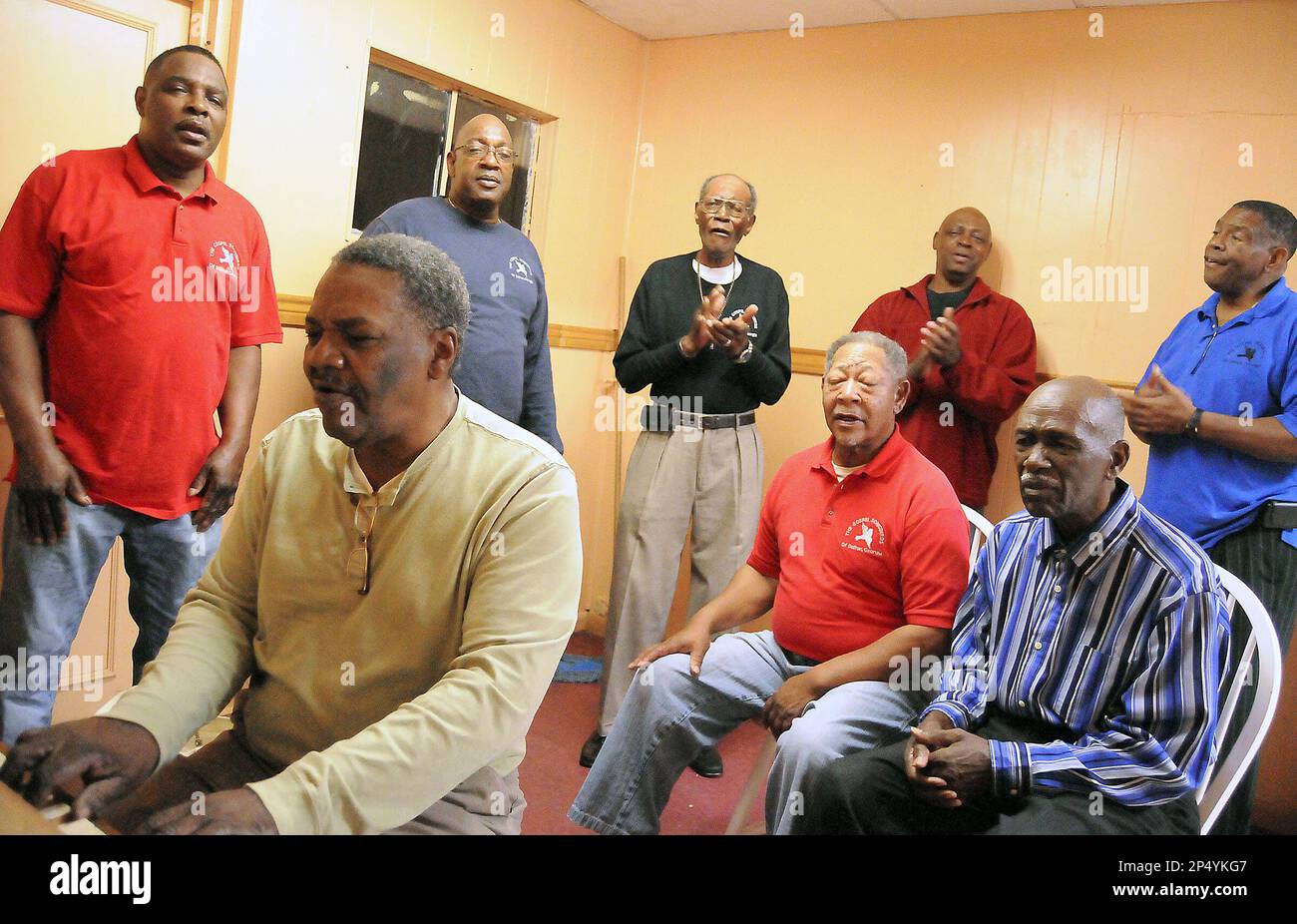 In this Nov. 6, 2013 photo, Eli Ellington plays piano as the Songbirds