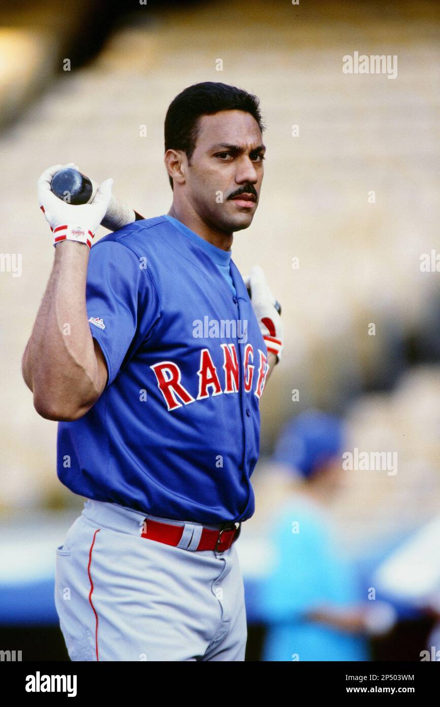 Juan Gonzalez of the Texas Rangers during a game against the Los Angeles  Dodgers at Dodger Stadium circa 1999 in Los Angeles, California. (Larry  Goren/Four Seam Images via AP Images Stock Photo 