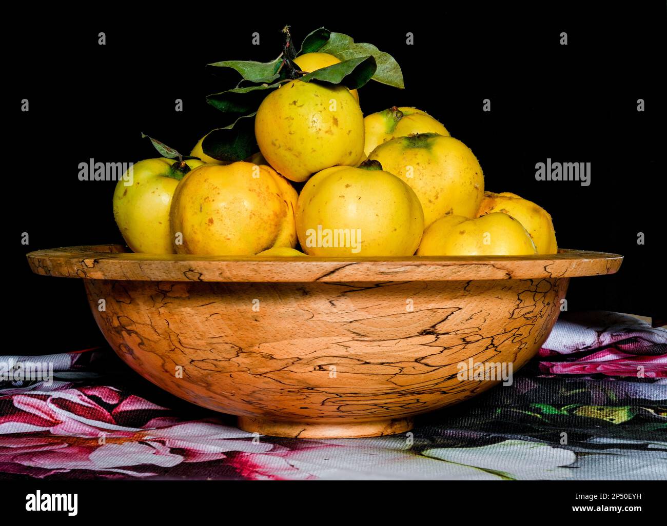 English Grown Quinces in Spalted Beech Bowl Stock Photo