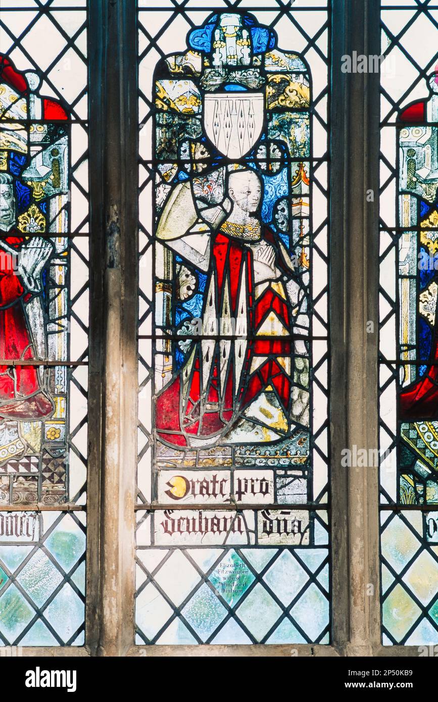 Medieval stained glass window, view of a well preserved medieval stained glass portrait of Lady Elizabeth Fitzwauter, Holy Trinity Church Long Melford Stock Photo