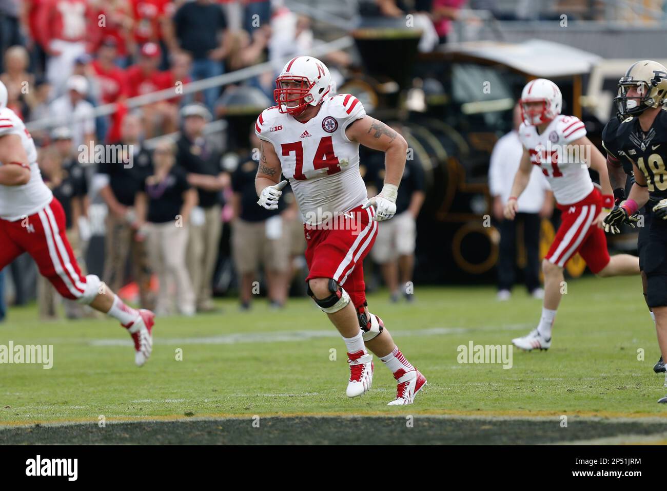 Nebraska offensive lineman Mike Moudy (74) runs during an NCAA Football