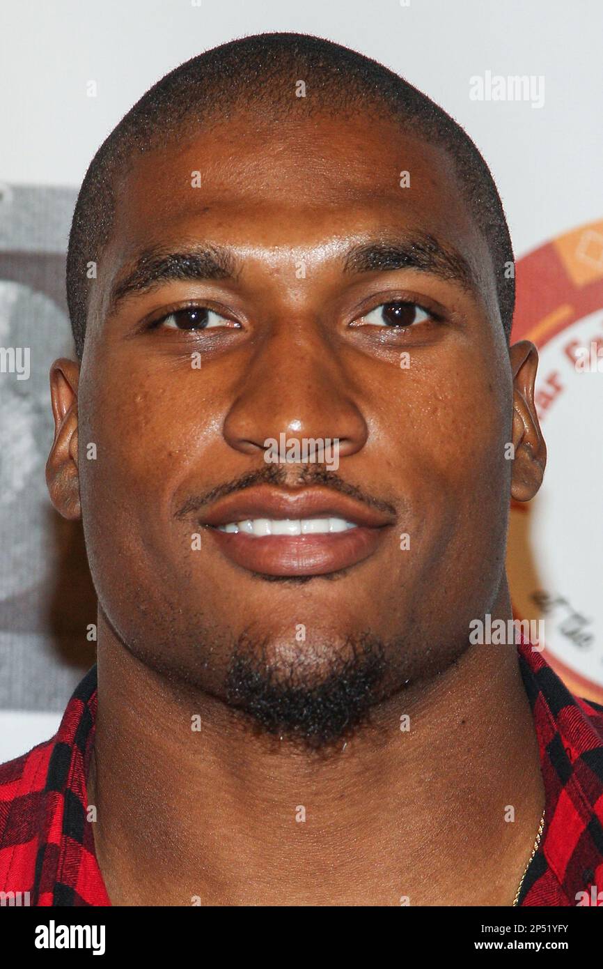 Professional football player Larry English attends the 8th Annual BTE