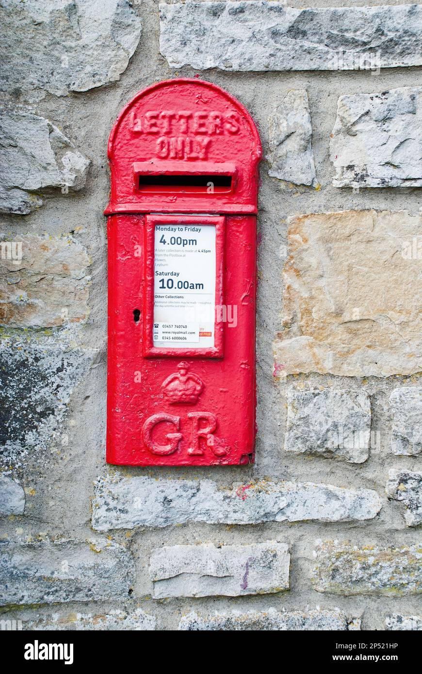 GR pillarboxred letter box set in a wall not far from Sedbusk in