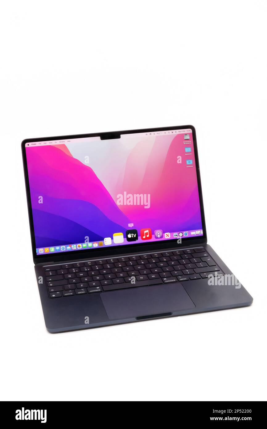 apple macbook air showing lid open and finder desktop on screen Stock