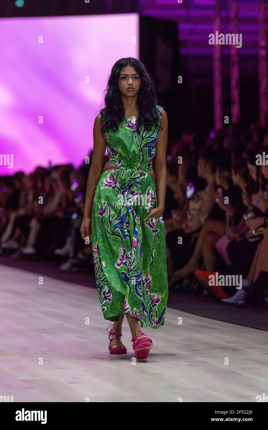 A model dressed by Aje walks the runway at the Utopia runway show, showcasing the best of Australian fashion, as part of the Melbourne Fashion Festival, at the Royal Exhibition Building in Carlton, Melbourne. Australian designers take centre stage at the Melbourne Fashion Festival's first show, Utopia. The Royal Exhibition Building in Carlton will be the venue for this all-Australian lineup featuring designers such as Aje, Nevenka, Acler, Van Der Kooij, Ginger & Smart, Leo Lin, and Maara Collective. These designers will showcase their unique styles and cutting-edge fashion to the world. The Me Stock Photo