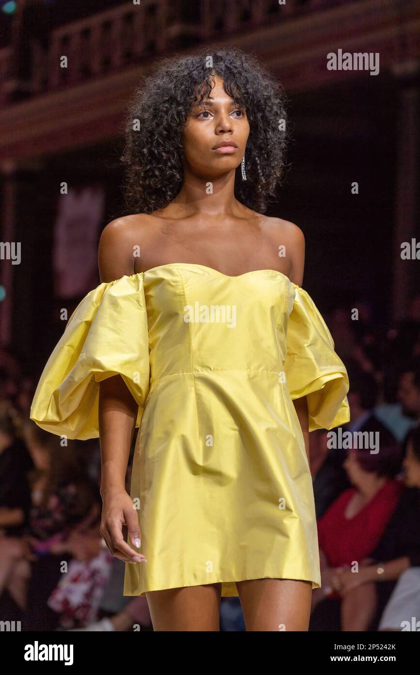 A model dressed by Van Der Kooij walks the runway at the Utopia runway