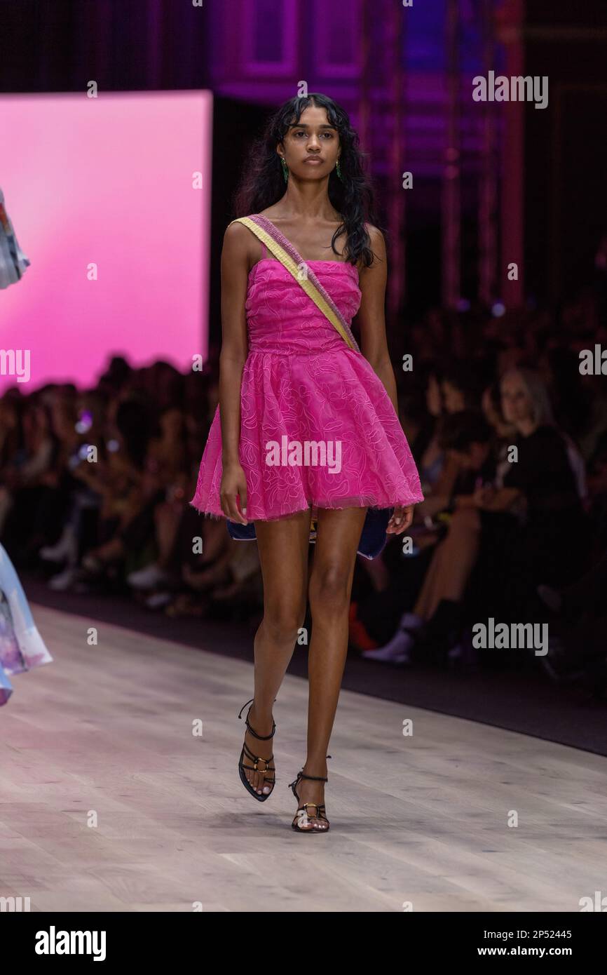 A model dressed by Aje walks the runway at the Utopia runway show, showcasing the best of Australian fashion, as part of the Melbourne Fashion Festival, at the Royal Exhibition Building in Carlton, Melbourne. Australian designers take centre stage at the Melbourne Fashion Festival's first show, Utopia. The Royal Exhibition Building in Carlton will be the venue for this all-Australian lineup featuring designers such as Aje, Nevenka, Acler, Van Der Kooij, Ginger & Smart, Leo Lin, and Maara Collective. These designers will showcase their unique styles and cutting-edge fashion to the world. The Me Stock Photo