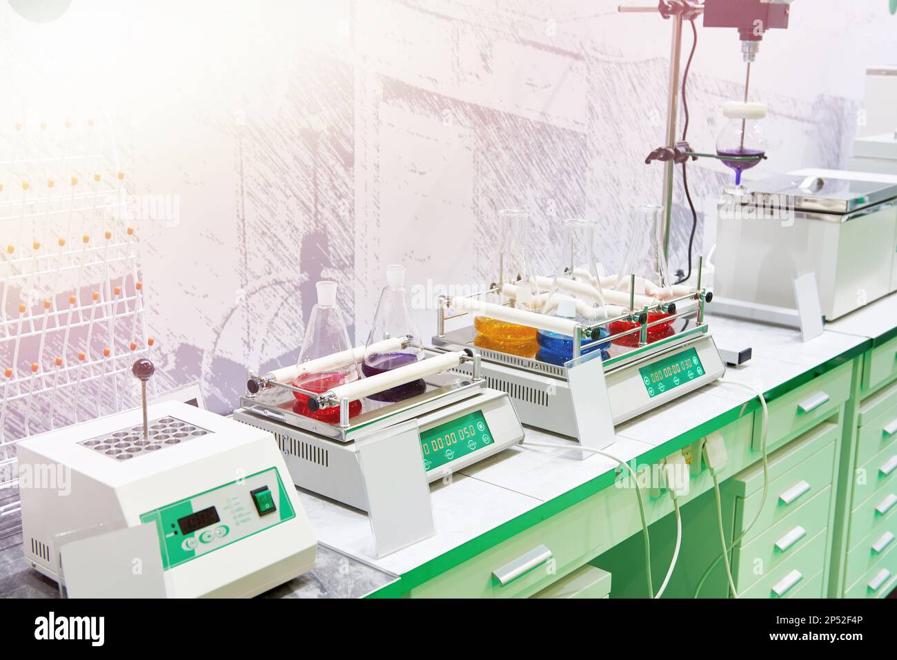 Shakers for chemical laboratory with flackes Stock Photo