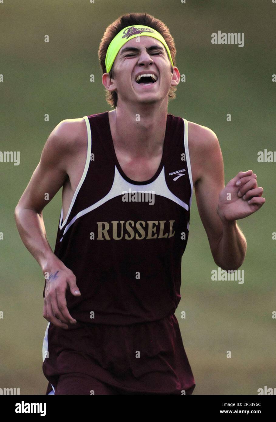 Jonathan Riley Runner Russell High School's Josh Riley reaches the finish line in first place ...