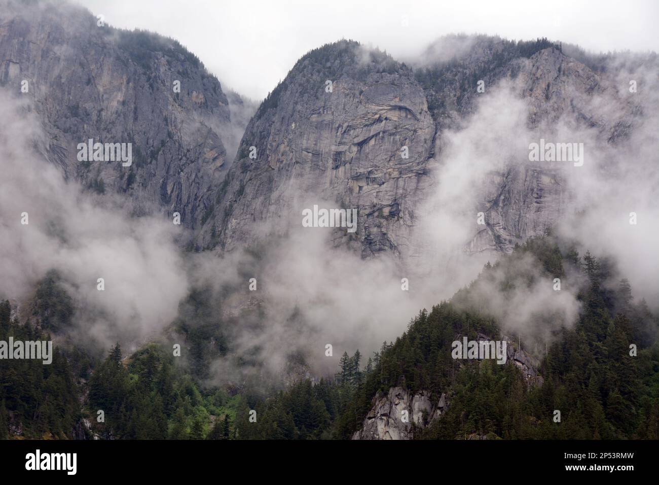 The misty rocky cliffs and slopes of Hope Mountain, in the Skagit Ranges of the North Cascade