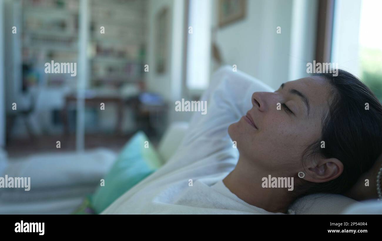 Photo inspiration: Fresh Look at Woman Relaxing At Home Lying On Couch In Living Room