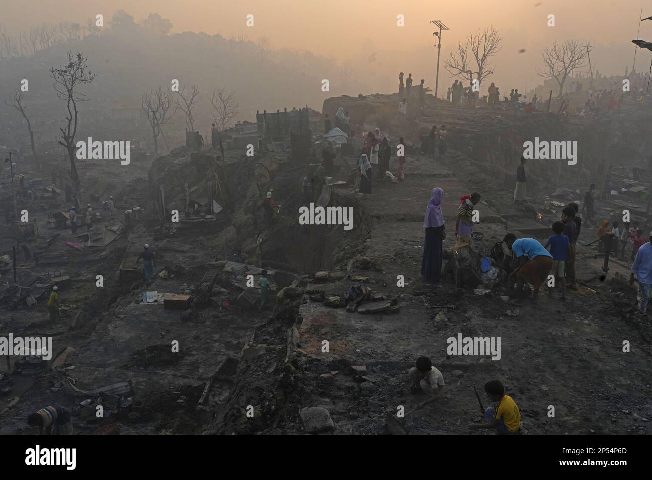 KUTUPALONG, Chittagong, Bangladesh. 7th Mar, 2023. KUTUPALONG, Bangladesh: A fire destroyed 2,000 shelters at a Rohingya refugee camp in southeastern Bangladesh on Sunday, leaving about 12,000 people without shelter.The fire broke out at about 2:45 p.m. at Camp No. 11 in Kutupalong, one of the world's largest refugee settlements, and rapidly engulfed the bamboo-and-tarpaulin shelters, .''Some 2,000 shelters have been burnt, leaving about 12,000 forcibly displaced Myanmar nationals shelterless, '' .At least 35 mosques and 21 learning centers for the refugees were also destroyed, though there Stock Photo