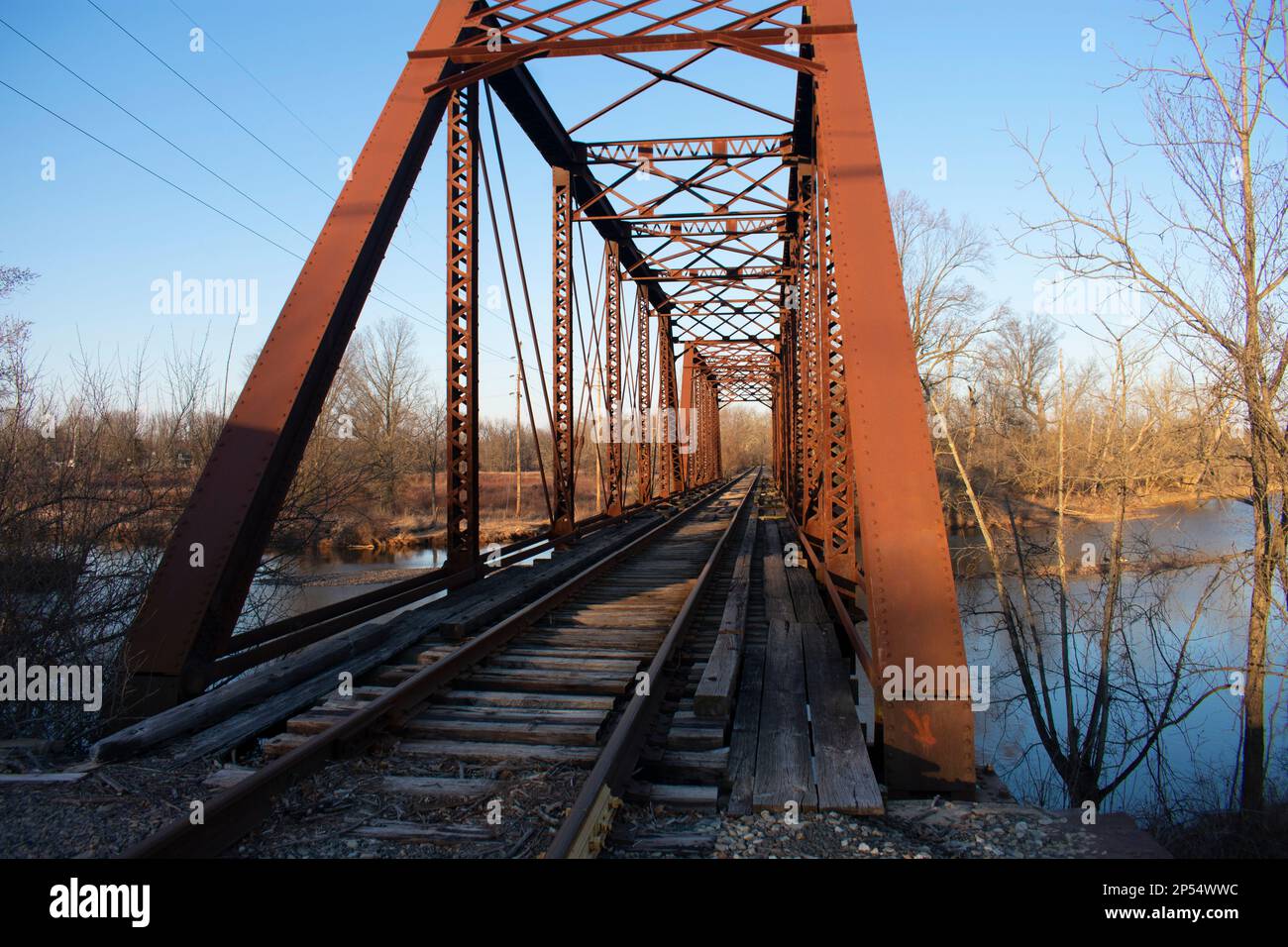 Railroad truss bridge over the Raritan river at Flemington, New Jersey, on a sunny winter day -04 Stock Photo
