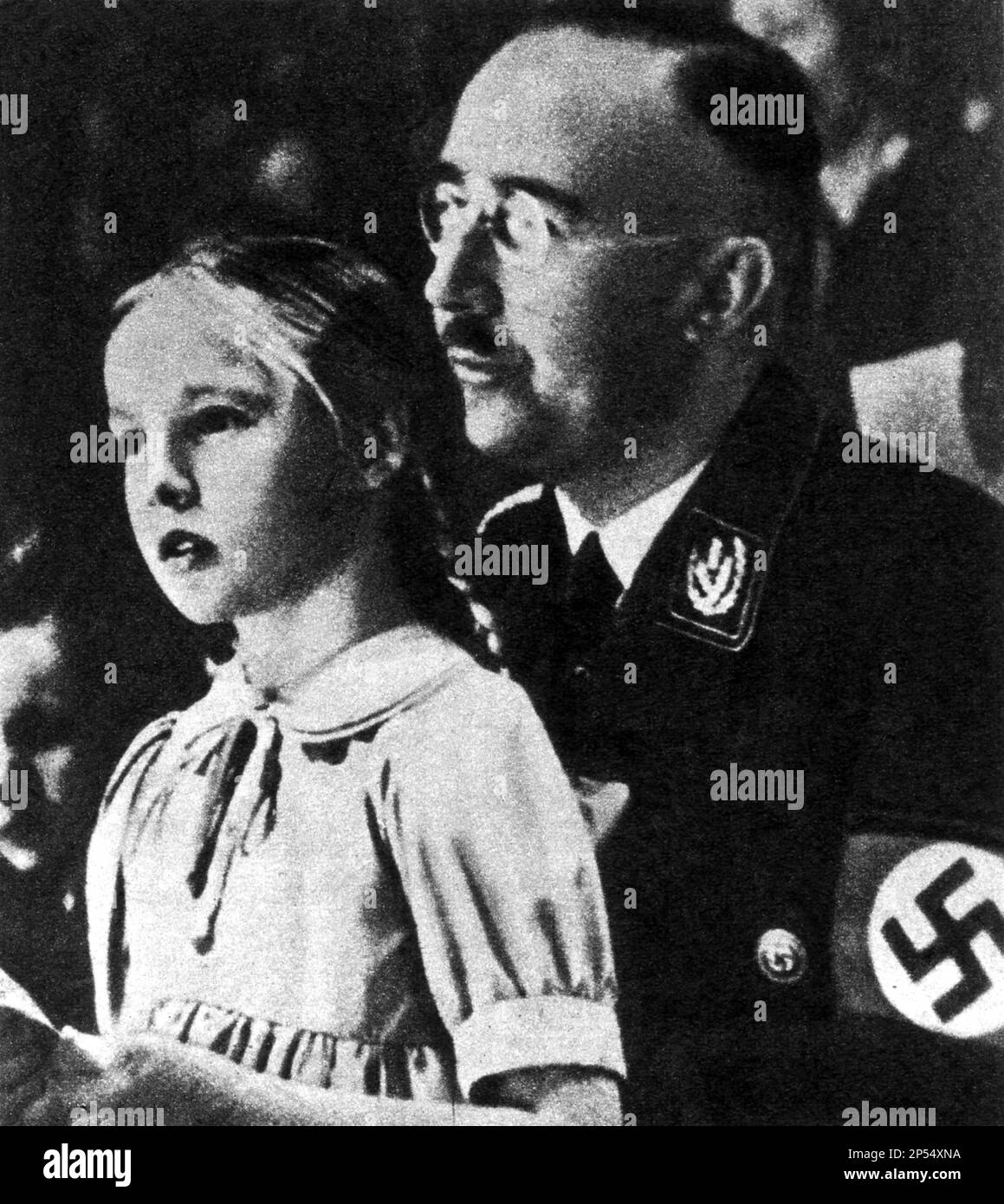 The Gestapo and SS chief , anti jewish Nazi Heinrich HIMMLER ( 1900 - 1945 ) with his daugther GUDRUN .  - HISTORY - NAZISMO - NAZISTA - NAZISM - NAZIST - svastica - padre e figlia  ----  Archivio GBB Stock Photo