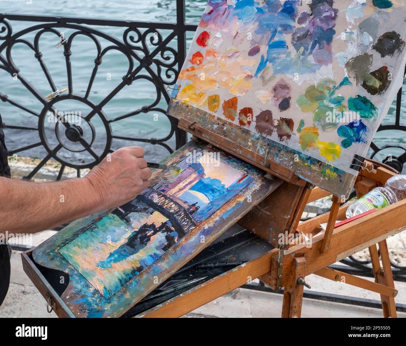 Street artists easel and paints, San Marco, Venice, Italy Stock Photo