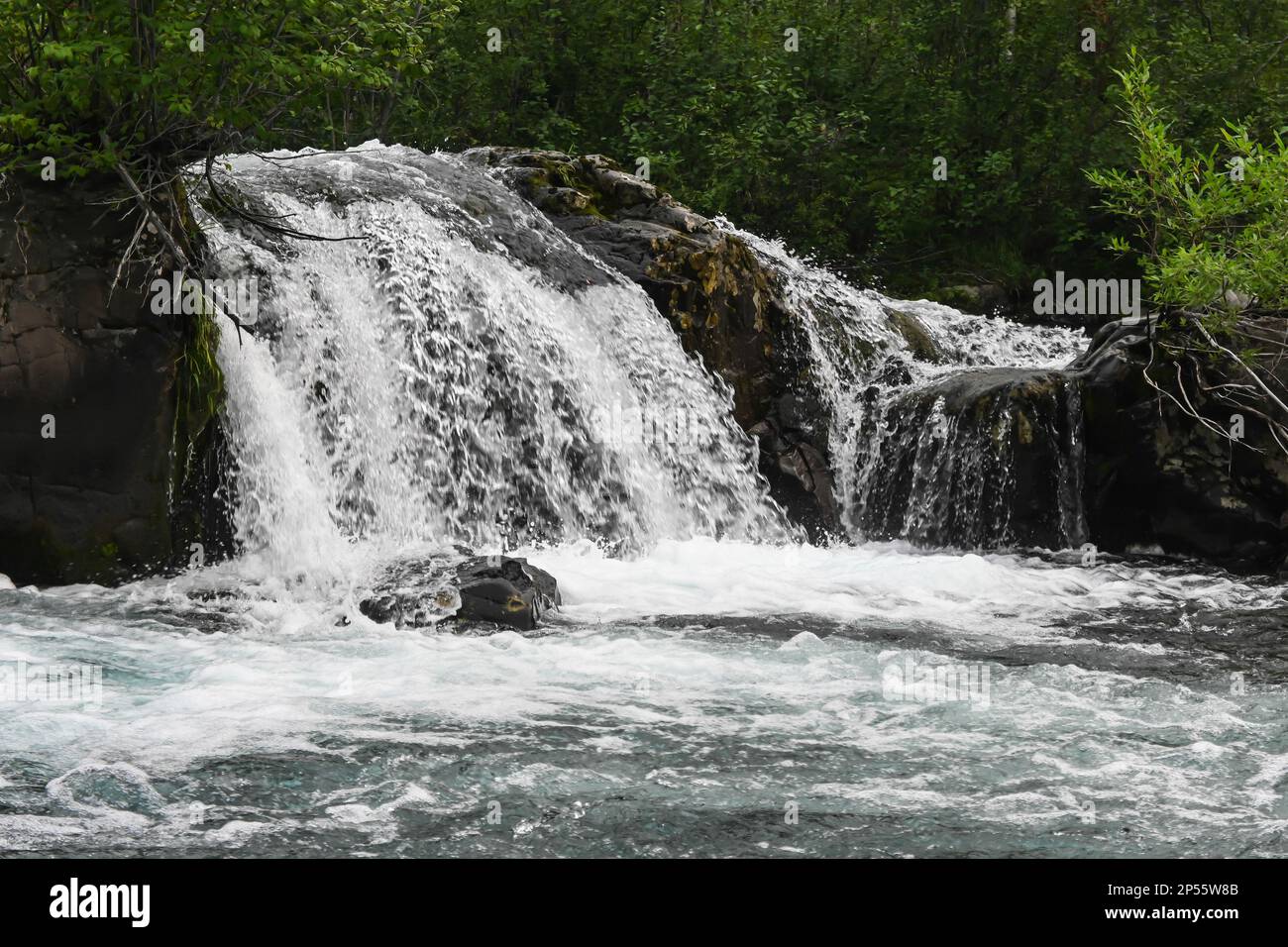 Putorana Plateau, a waterfall on the Grayling Stream. Mountain stream on a  cloudy day Stock Photo - Alamy