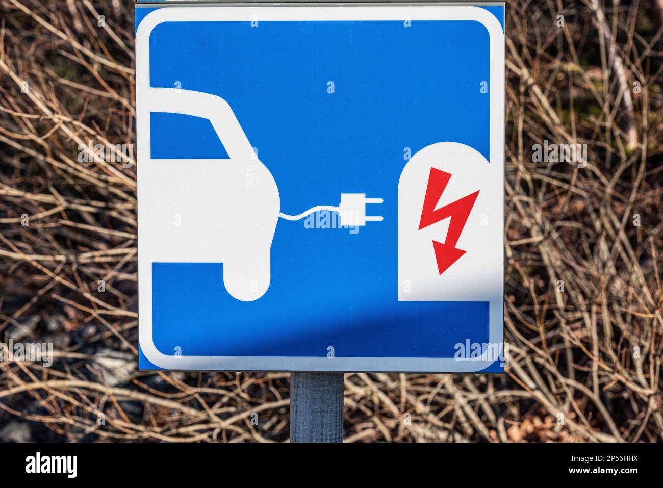 Electric car charger available sign Stock Photo - Alamy