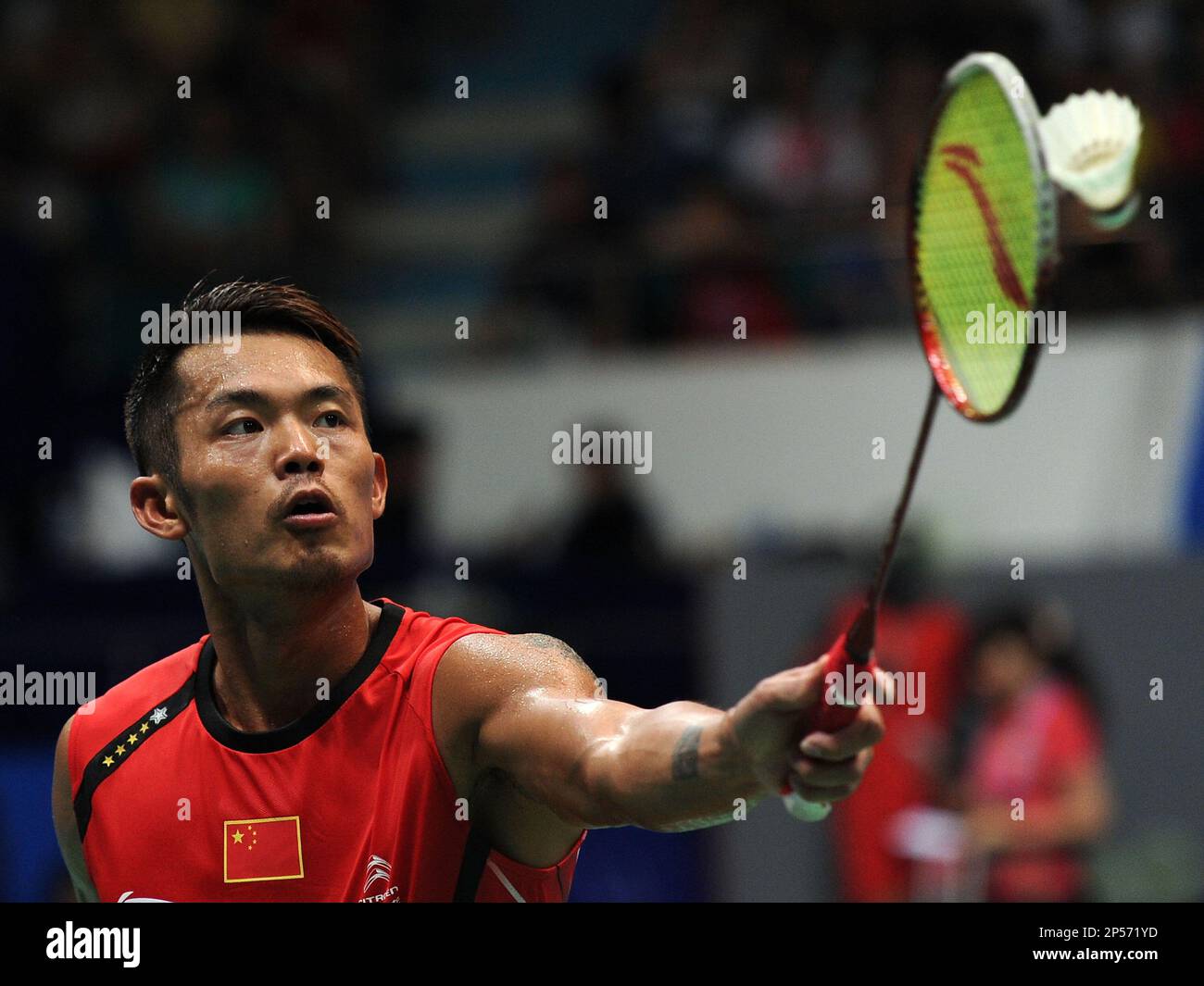 Lin Dan of China in action during a mens singles semifinal against Tien Minh Nguyen of Vietnam at the 2013 BWF Badminton World Championships in Guangzhou in south Chinas Guangdong province on