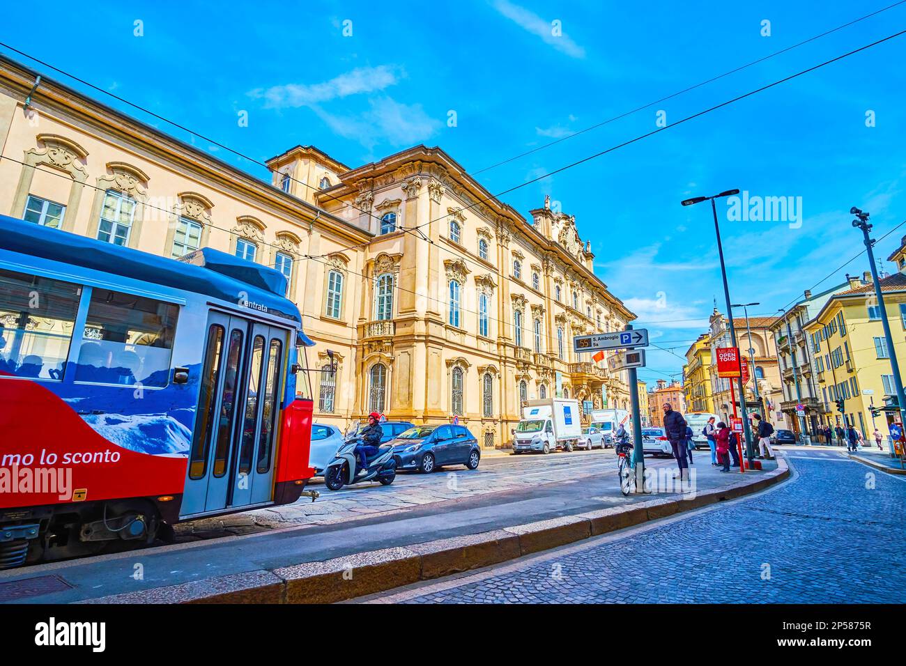 MILAN, ITALY - APRIL 11, 2022: Urban scene on Corso Magenta street with ridding tram, on April 11 in Milan, Italy Stock Photo