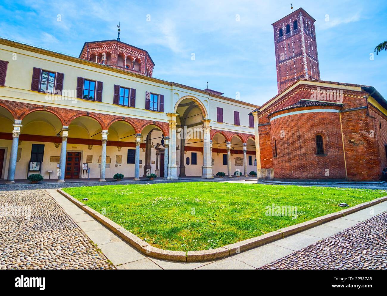 Oratorio di San Sigismondo building and arcades of Church of Saint Ambrose in Basilica of Sant'Ambrogio complex of Milan, Italy Stock Photo