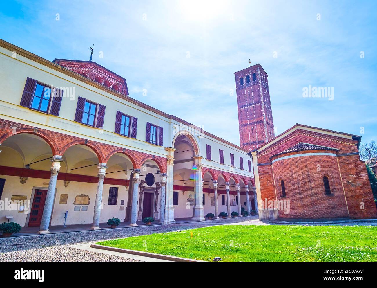 Ancient church. and Oratorio di San Sigismondo in the courtyard of Basilica di Sant'Ambrogio complex, Milan, Italy Stock Photo