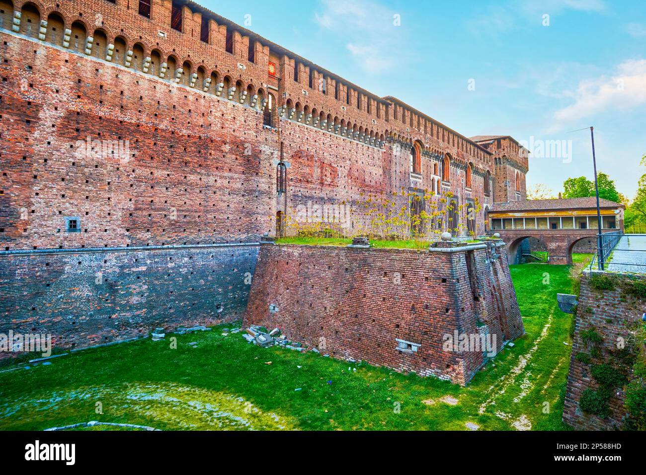 Deep dug moat surrounding the walls of Sforza's Castle in Milan, Italy ...