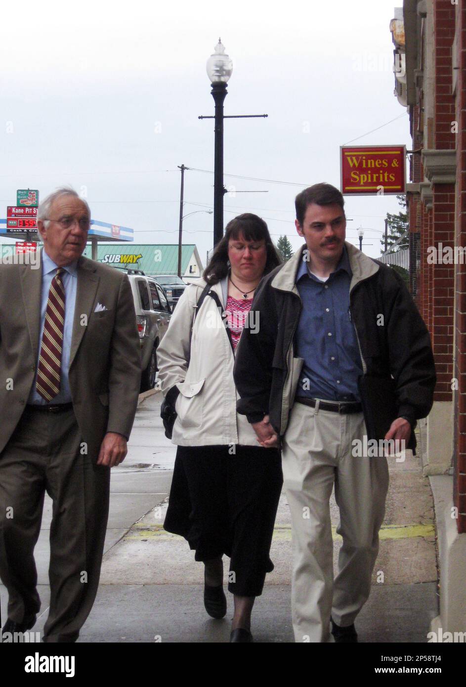 In this April 24, 2013 photo, from left, defense attorney Alexander Lindsay, Susan Hooper and