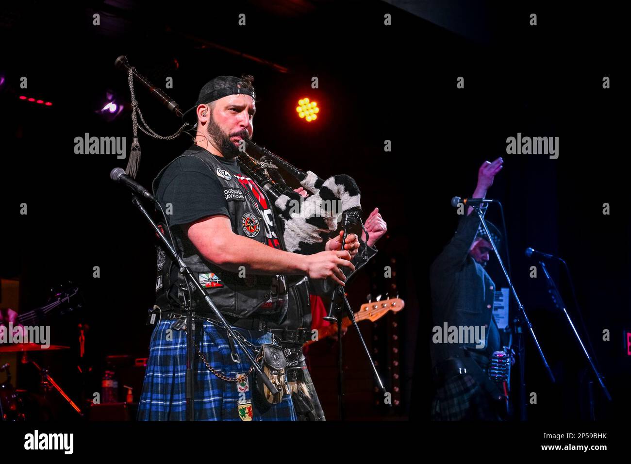 Piper, Aspy Luison, bagpipes, The Real McKenzies, Canadian Celtic punk band  in concert Stock Photo - Alamy