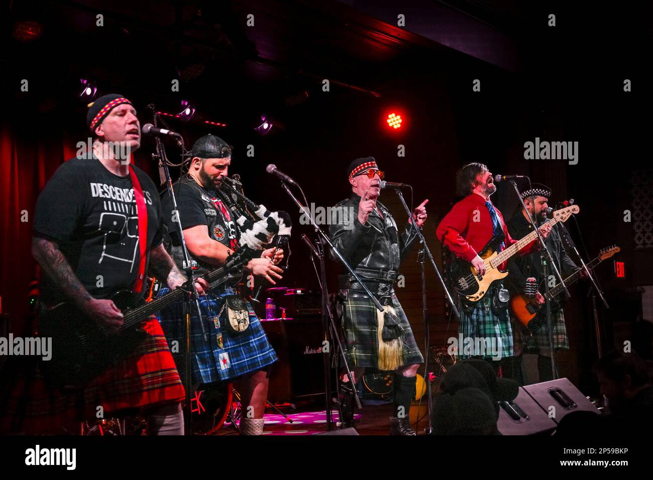 Piper, Aspy Luison, bagpipes, The Real McKenzies, Canadian Celtic punk band  in concert Stock Photo - Alamy