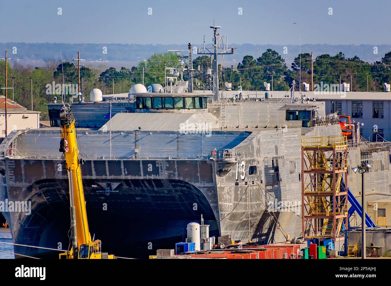 The USNS Apalachicola (EPF 13) is docked outside Austal USA’s shipbuilding facility on the Mobile River, Jan. 30, 2023, in Mobile, Alabama. Stock Photo